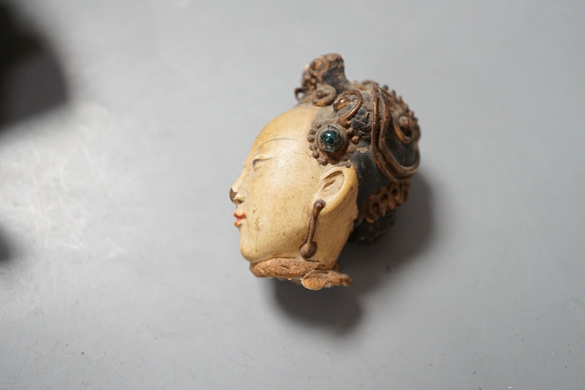 A Chinese carving of a deity, 32cm, a prunus jar, miniature vase, etc.